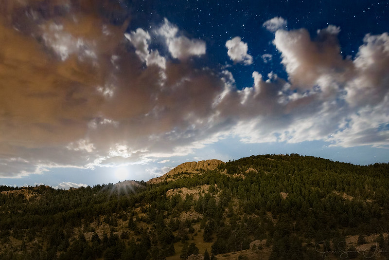 Moonset behind Horsetooth Mountain by Jeanie Sumrall-Ajero